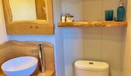 Hand crafted live edge accents in Maple Lodge shower room.jpg 10