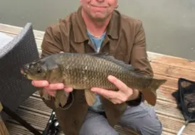 guest-with-carp-fish-by-lake-view-lodge-mill-farm-leisure 80
