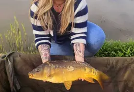 guest-with-carp-tranquil-fishing-photo-mill-farm 102